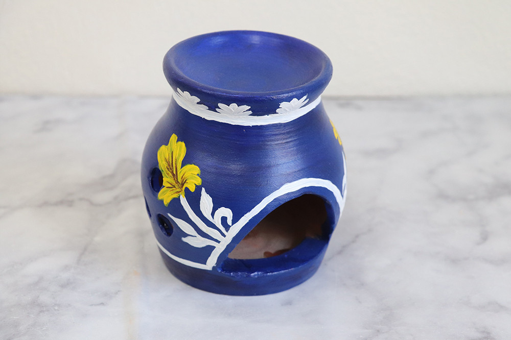 Burners for oil perfumes - Hover