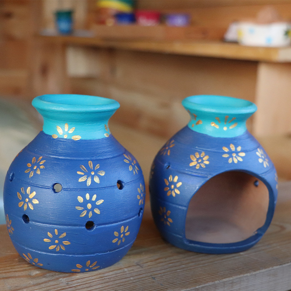 Burners for oil perfumes